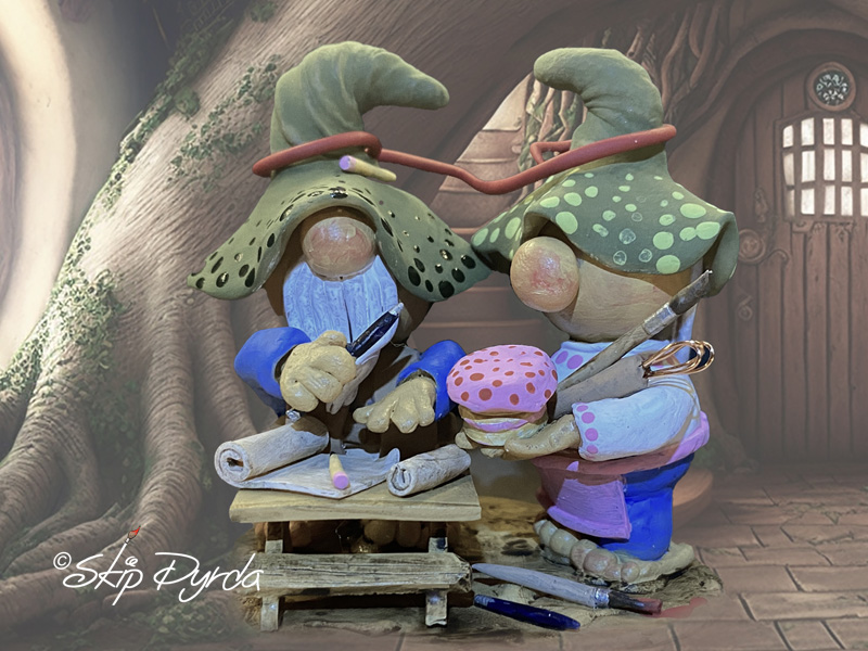 Painted clay gnome figurines as the architect and the baker