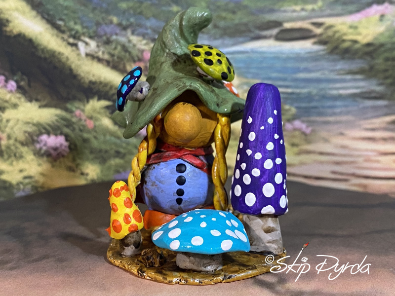 Painted clay gnome figurine as the Mushroom Queen